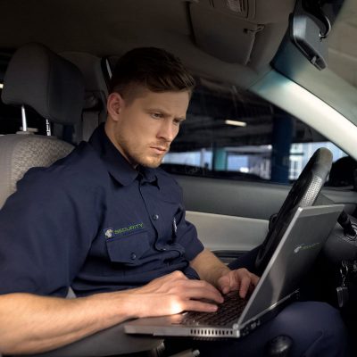Security Guard in Patrol Vehicle