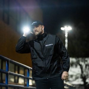 Security Guard holding his flashlight patrolling | Eastern Security in Altamonte Springs, FL